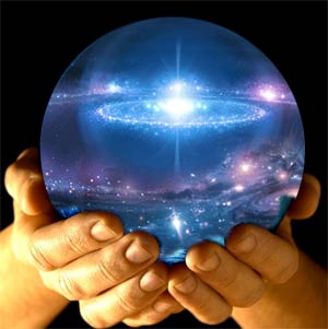 Hands holding the image of the universe in an orb