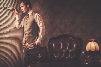 Man Looking out Window