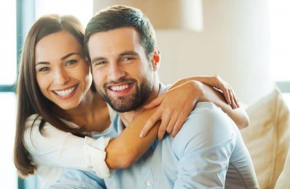 Man and woman embracing