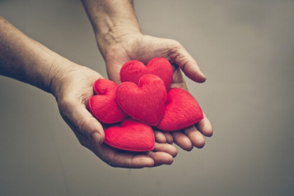 hand holding hearts