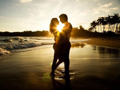 Silhouette of couple on beach