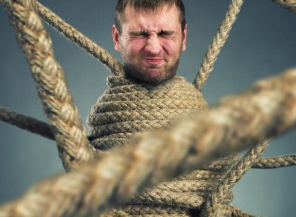 man-tied-up-rope