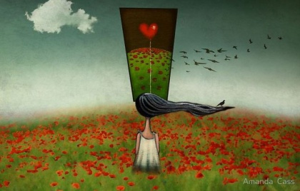 Girl in Field Looking at Heart