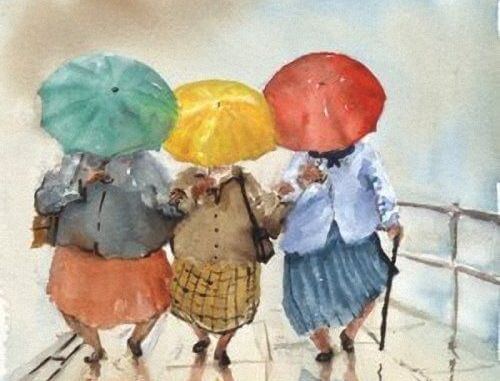 Vänner med paraplyer