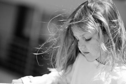 young girl sad childhood black and white