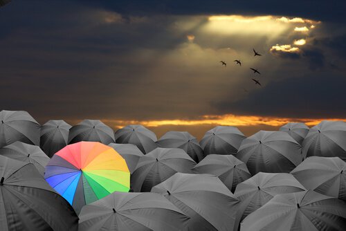 Rainbow Umbrella in a Crowd of Gray