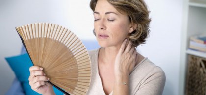 woman fanning herself