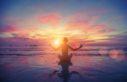 woman yoga sunset