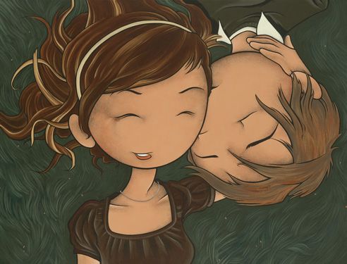 boy kissing girl on cheek