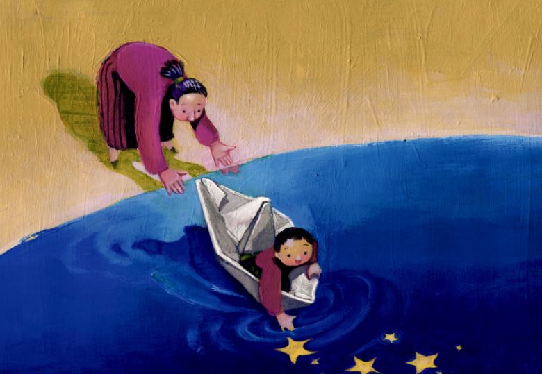 woman and child on beach paper boat reflection
