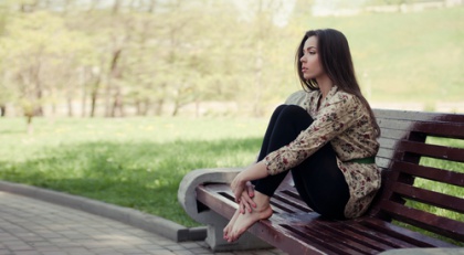 Woman Sitting in Contemplation