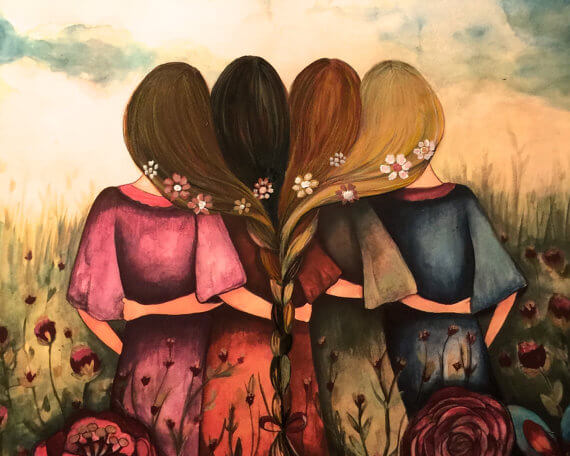 Vier vrouwen omarmen elkaar