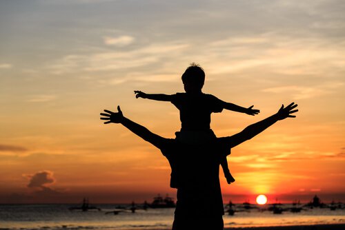 Child on Father's Shoulders