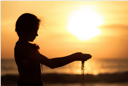 Child Playing with Sand