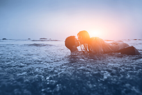 Couple Kissing in Ocean