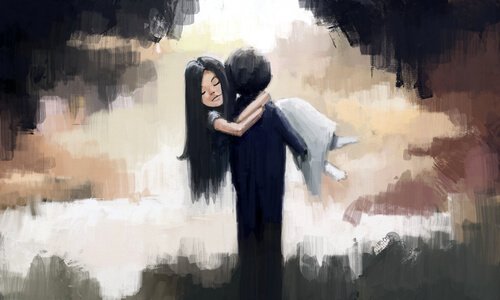 boy holding a girl in his arms 1