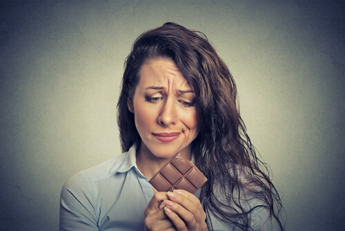 woman with chocolate eat