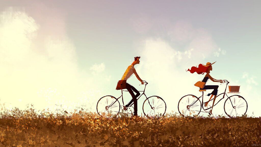couple riding on bicycles