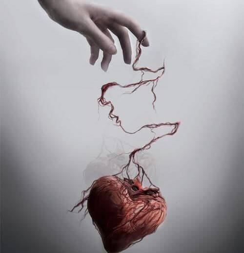 hand holding an abused heart-1