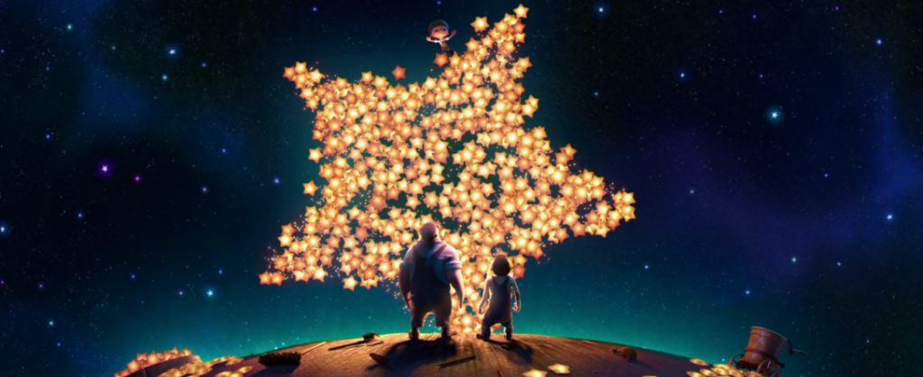 man and boy with giant star