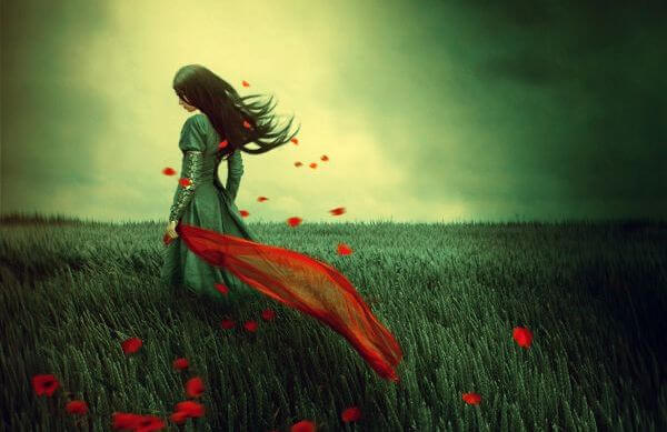woman in poppy field