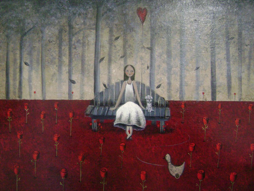 woman sitting on a chair with a dog and heart balloon