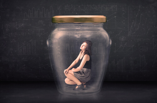 woman trapped in a jar afraid