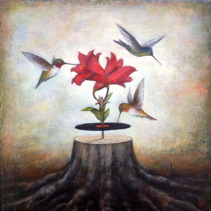 birds flying around a flower