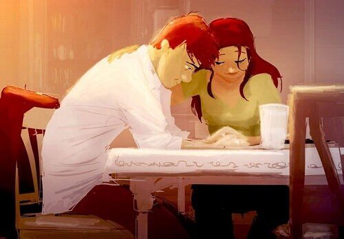 couple embracing at the table