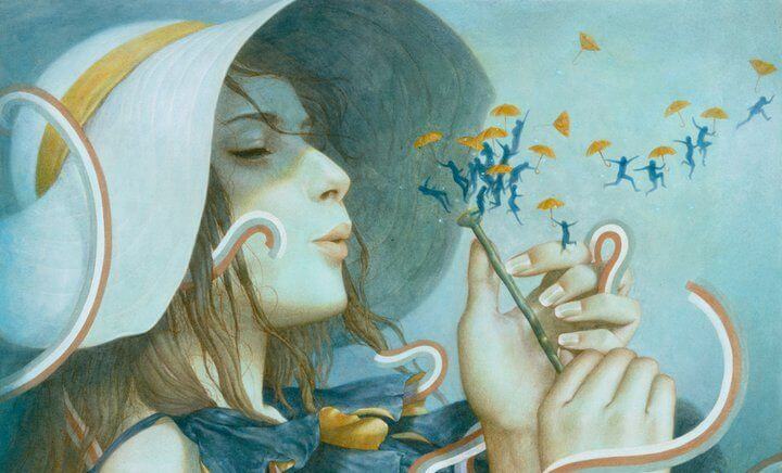 girl blowing dandelion