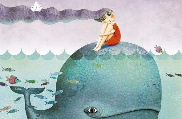 girl sitting on a whale