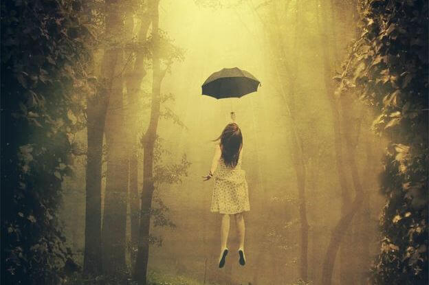 girl flying away with umbrella behavior