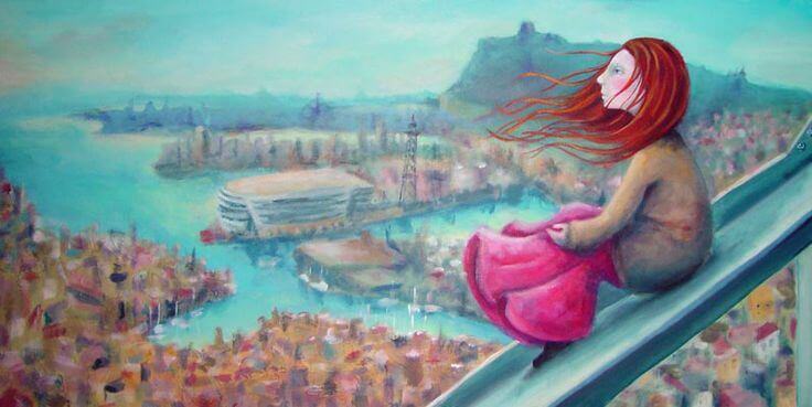 girl looking over city dreaming