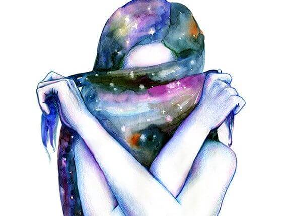 woman covering her face with her hair