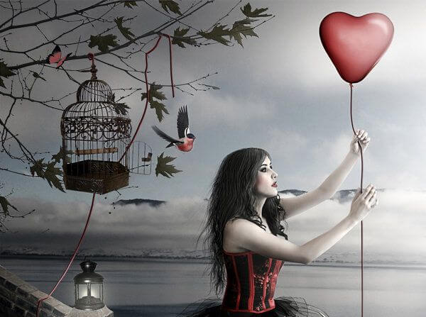 woman holding a heart-shaped balloon