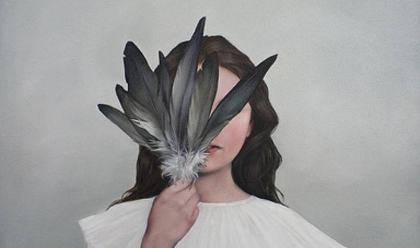 Girl Hiding Face with Feathers