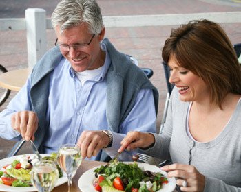 couple eating salads