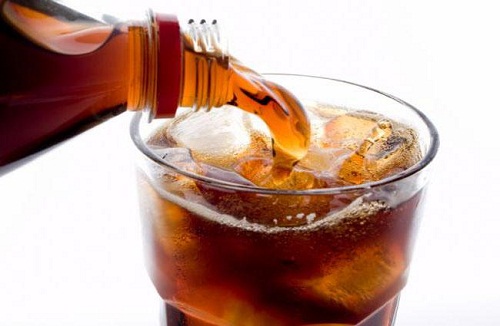 serving a glass of coke
