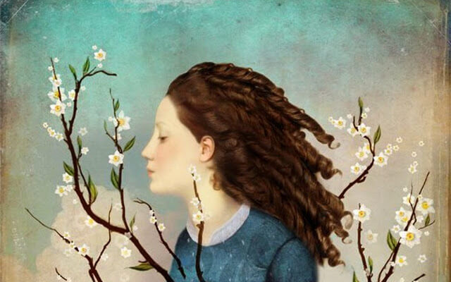 woman and branches with flowers