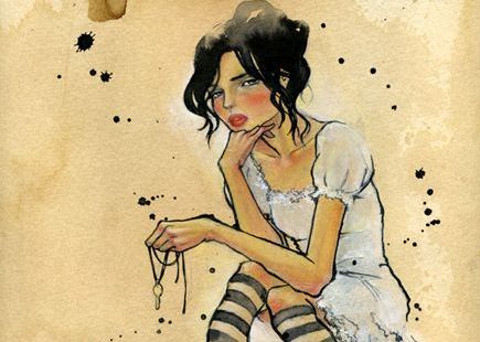 woman holding key necklace