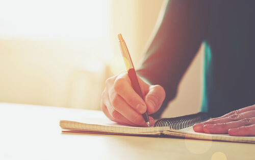 arm of a person writing