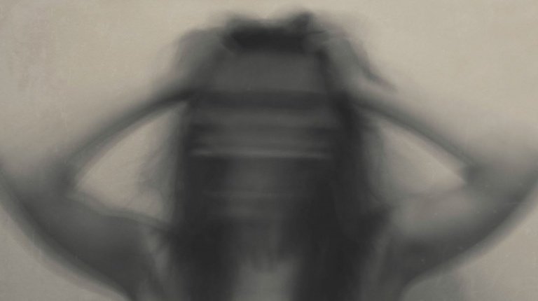 blurry woman with anxiety-768x430