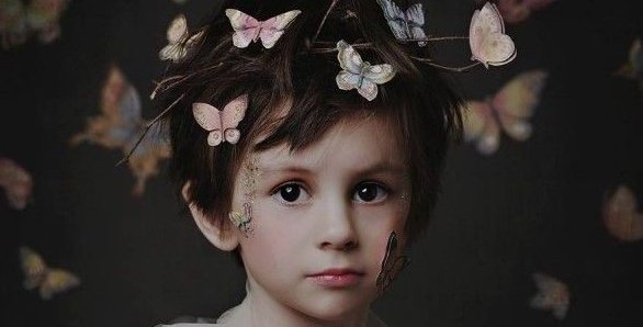 boy with butterflies on his head-e1456699760764