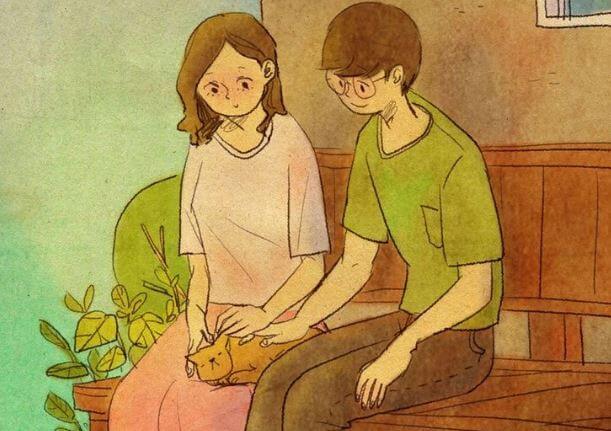 couple petting their cat