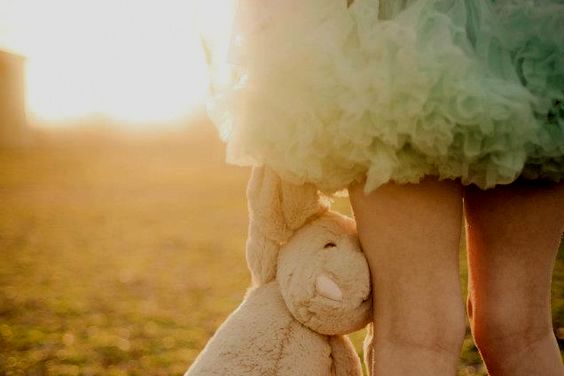 girl with stuffed bunny