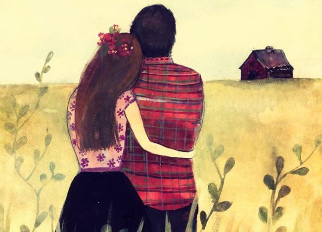 hugging couple looking at the horizon