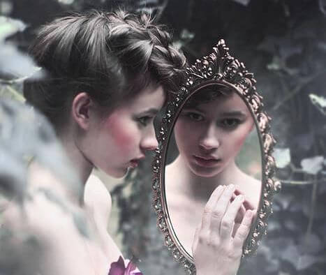 Girl Looking at Self in Mirror