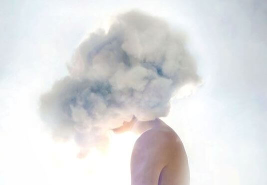 man with a cloud on his head representing i cant