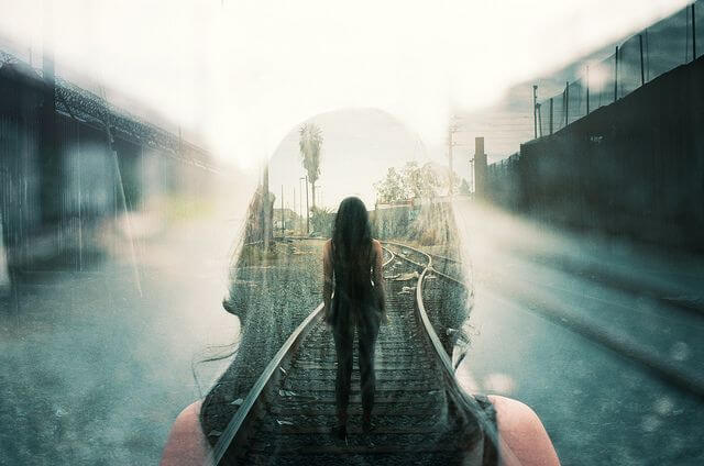 Woman Along Train Tracks