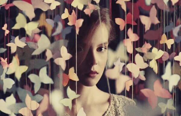 woman in a butterfly curtain